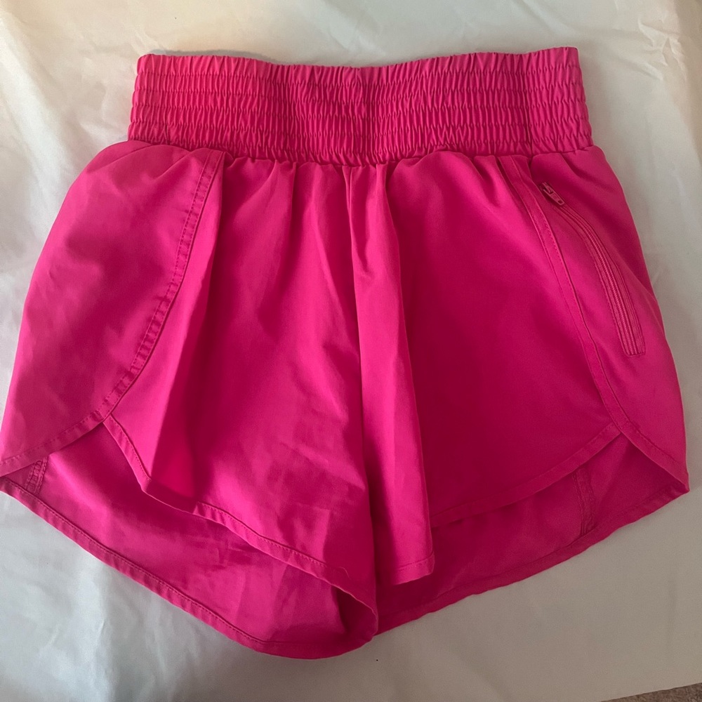 Hot pink running shorts
